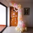 A love-dressed doorway and balloons