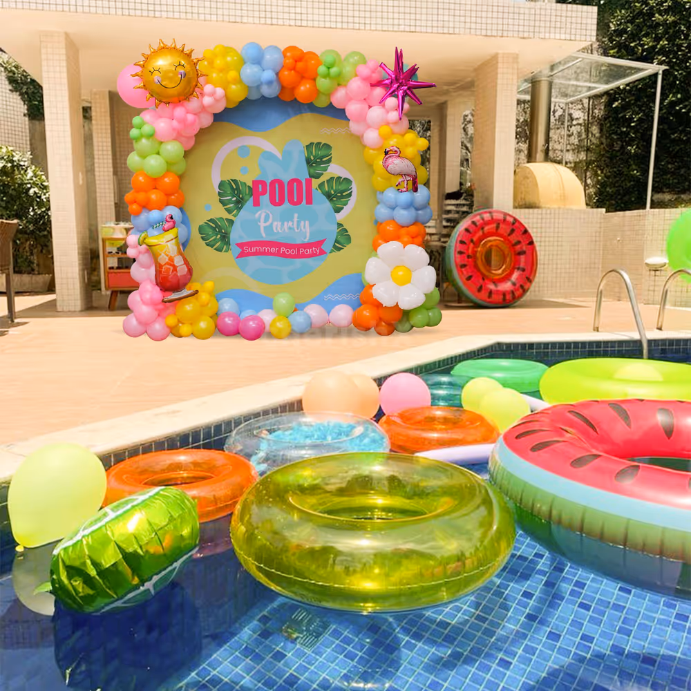 Rainbow-colored arch of orange pink green and blue balloons.