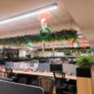 Reception desk decor with marigold garlands, paper birds cutouts and Ashoka Chakra