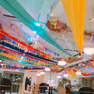 A vibrant room set up perfect for intimate festive gatherings.