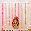 Pink garlands with Tassels infuse freshness into the ambience