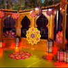Bright drapes and motifs create a joyful Diwali backdrop that mesmerizes.