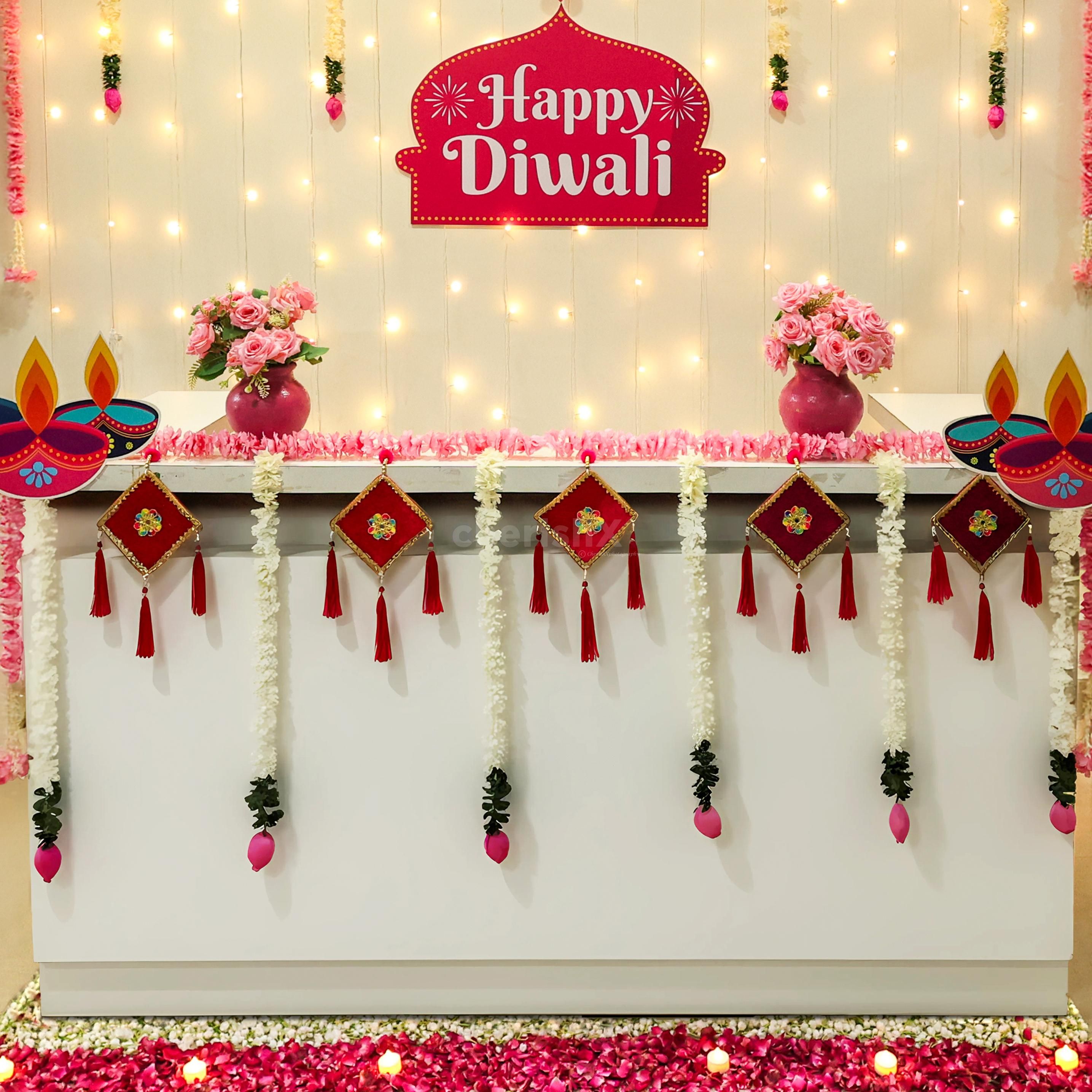 Paper diya cutouts and LED Candles infuse Diwali vibes into the Reception area