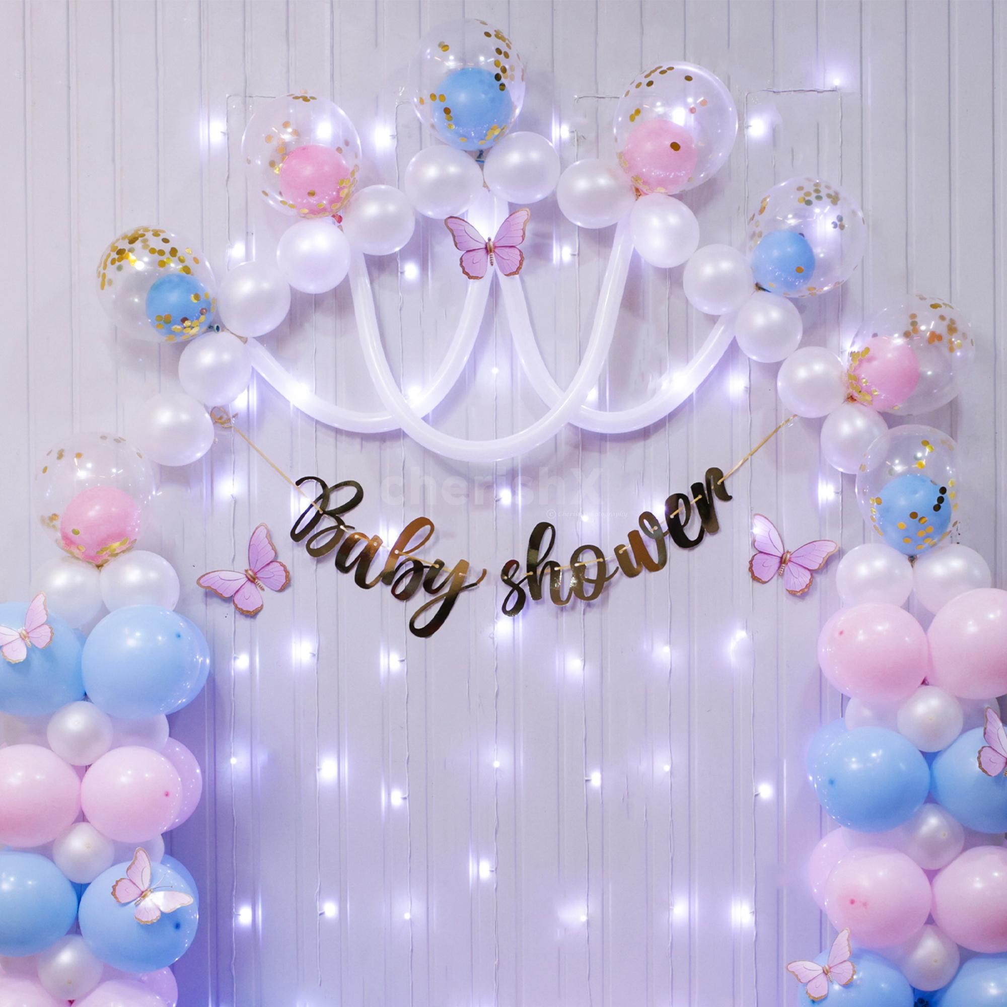 Baby shower full of lovely pastels lights and a soft flex