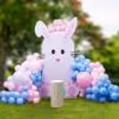Celebrate in full swing with giant bunny ears and lots of colorful balloons