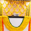 Reception area revives its energy with the positivity of yellow, orange and green layers
