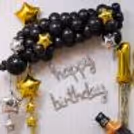 Capture the golden moments with scattered balloons of contrasting colors