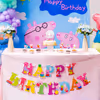 Free floating balloons add soft magic to peppa pig birthday celebration