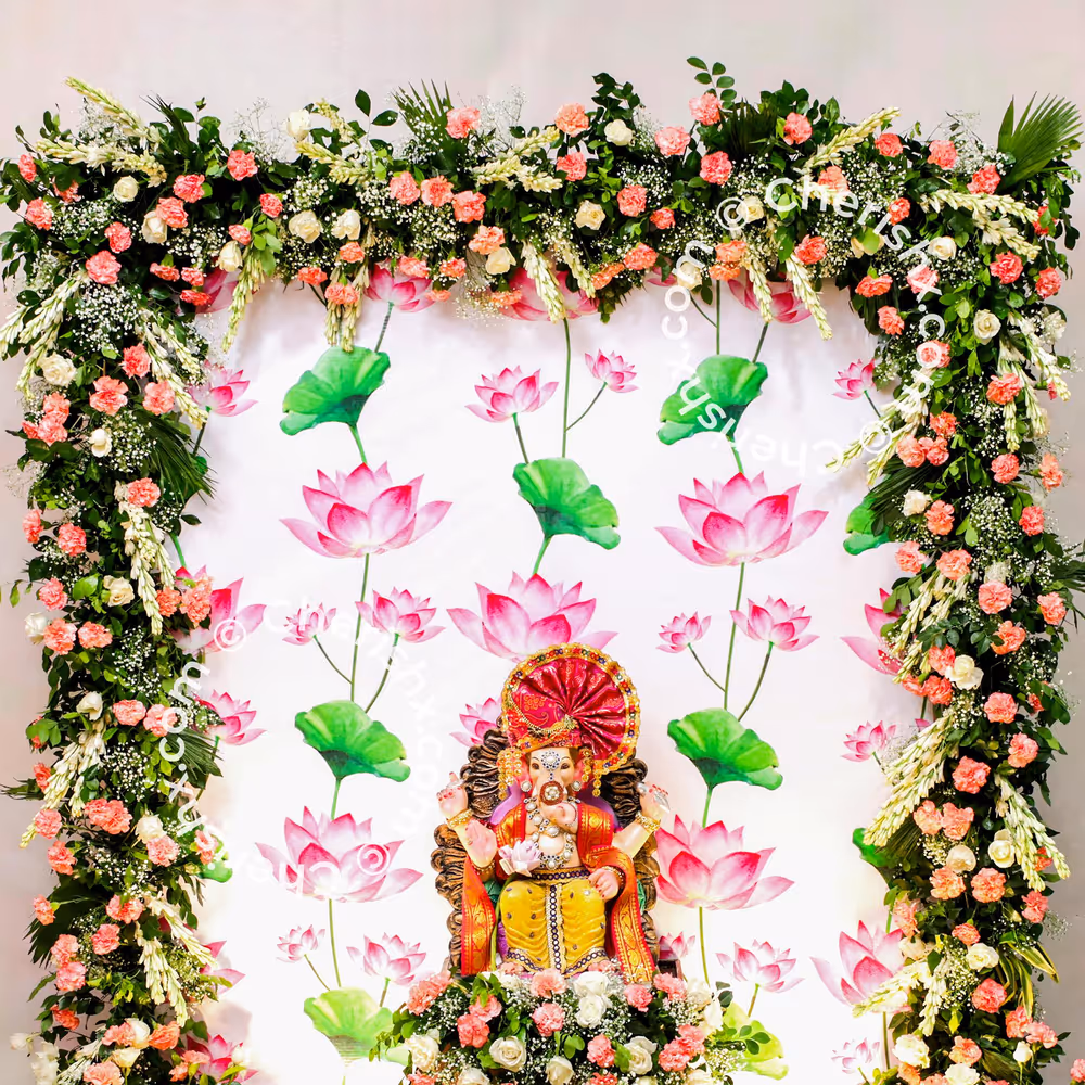 Floodlights and LED lights on lotus shaped candle holders glow up the decor