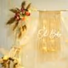 Jute textures and wooden accents establish a snug, earthy atmosphere.
