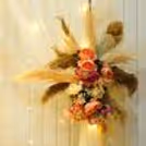 Softer LED candles radiate cozy, golden light to envelop the setup.