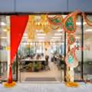The colorful arrangement of the entrance is complemented by warm lighting.