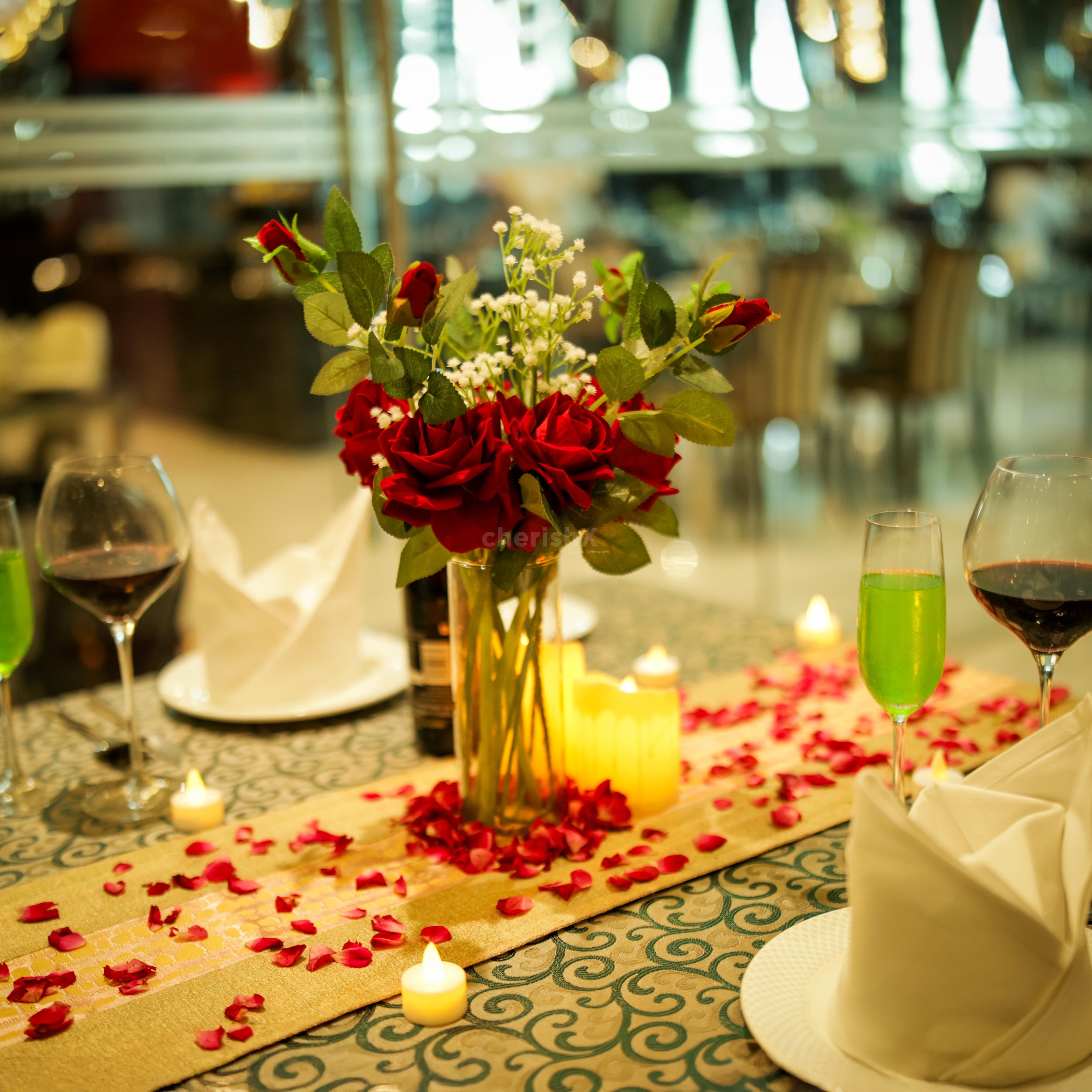 flower petal decor with candles for date night