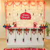Fairy lights and red velvet tassels add elegant festivity to the office's Diwali spirit.