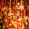 Fairy lights ensure the Christmas ceiling decoration glows warmly at the workplace