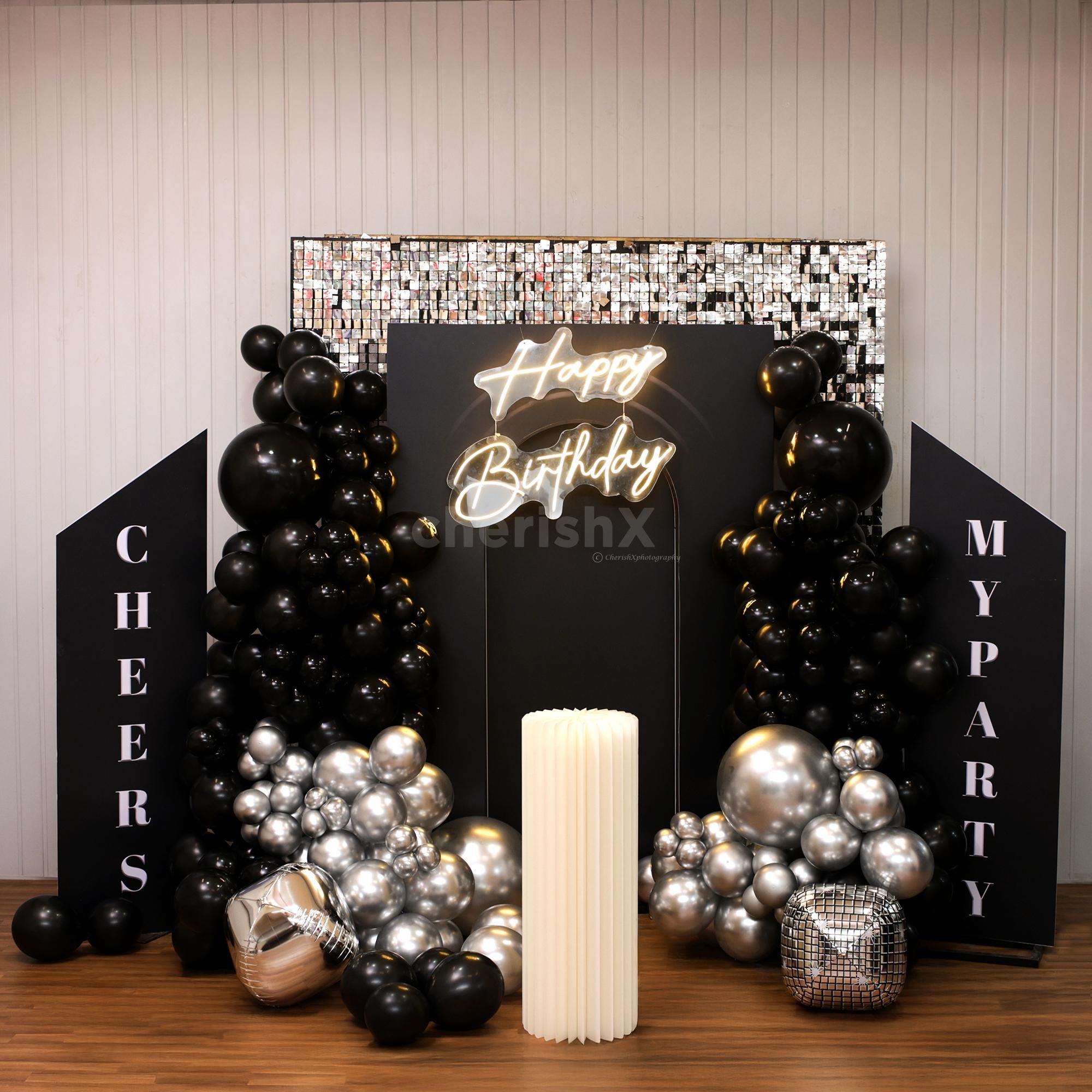 Glam black and silver balloon styling for an ageless birthday style.