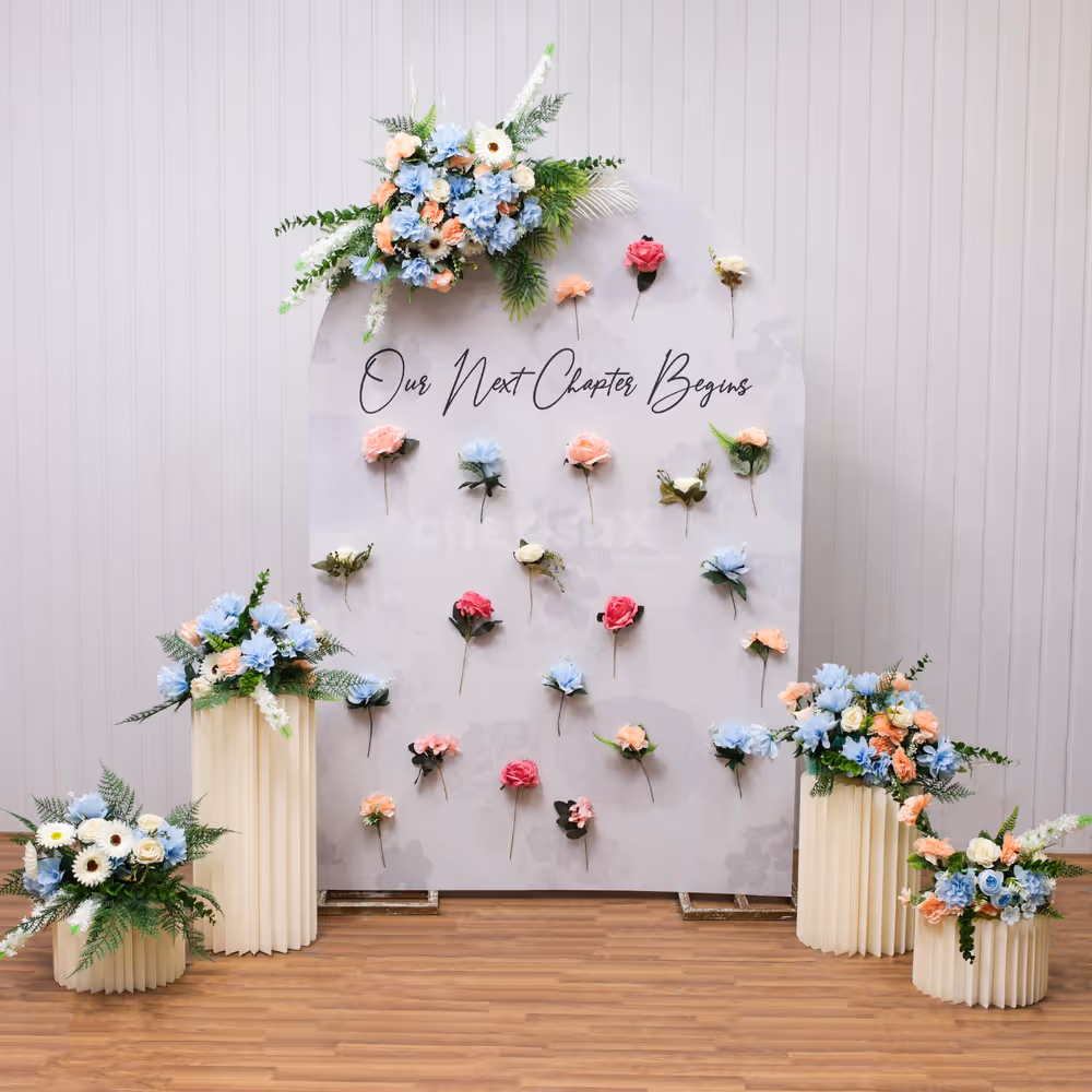 Engagement decor with a mix of single and multicolor flower bunches