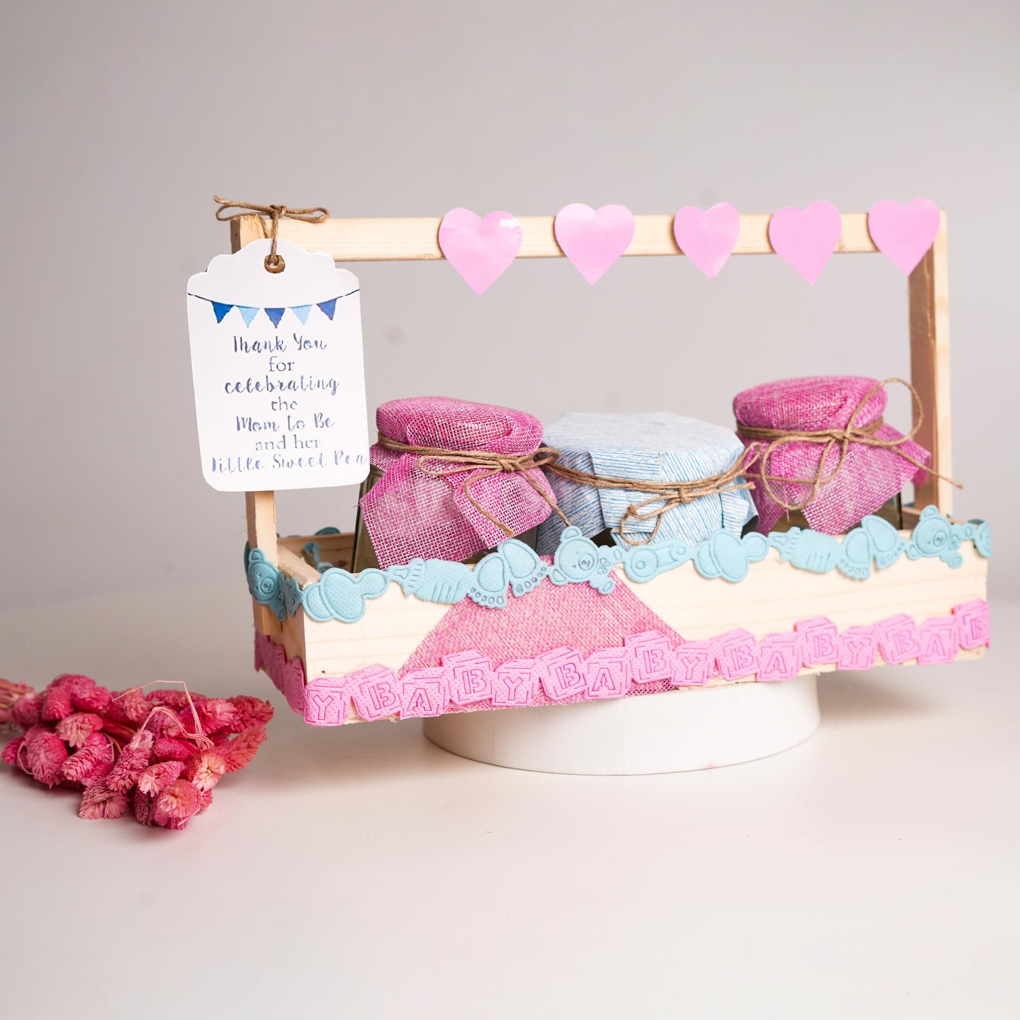 Soft pastel colours and gentle ornamentation make for a lovely memento.