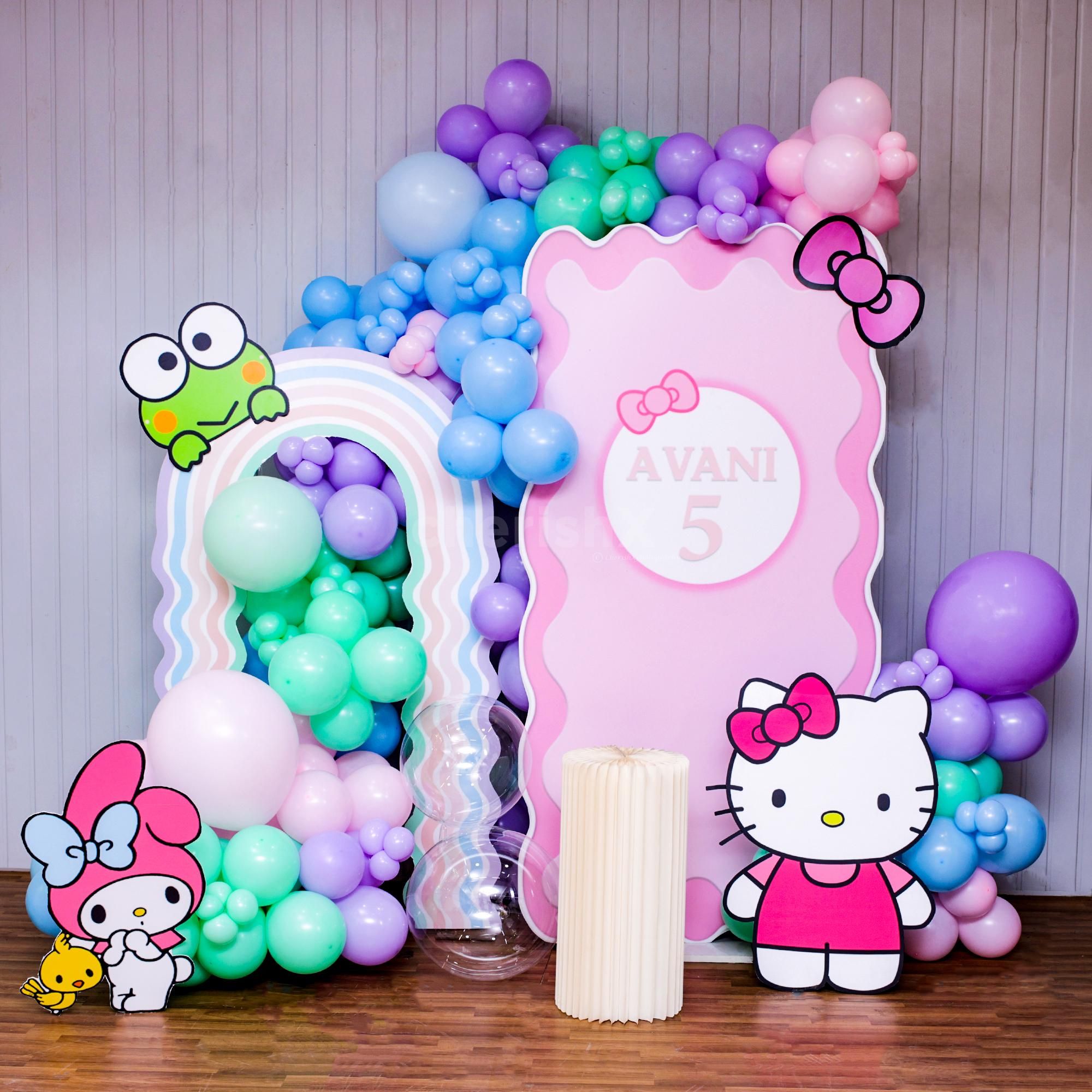 Cute Hello Kitty pastel background with rainbow decorations.