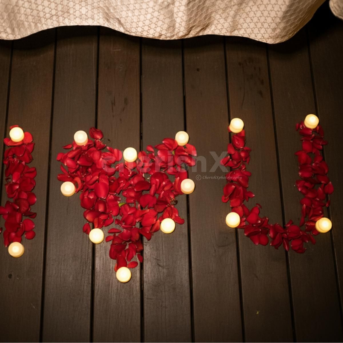 An elegant candlelight dining experience by the pool at Expo, Greater Noida featuring a beautifully decorated table and enchanting reflections on water.