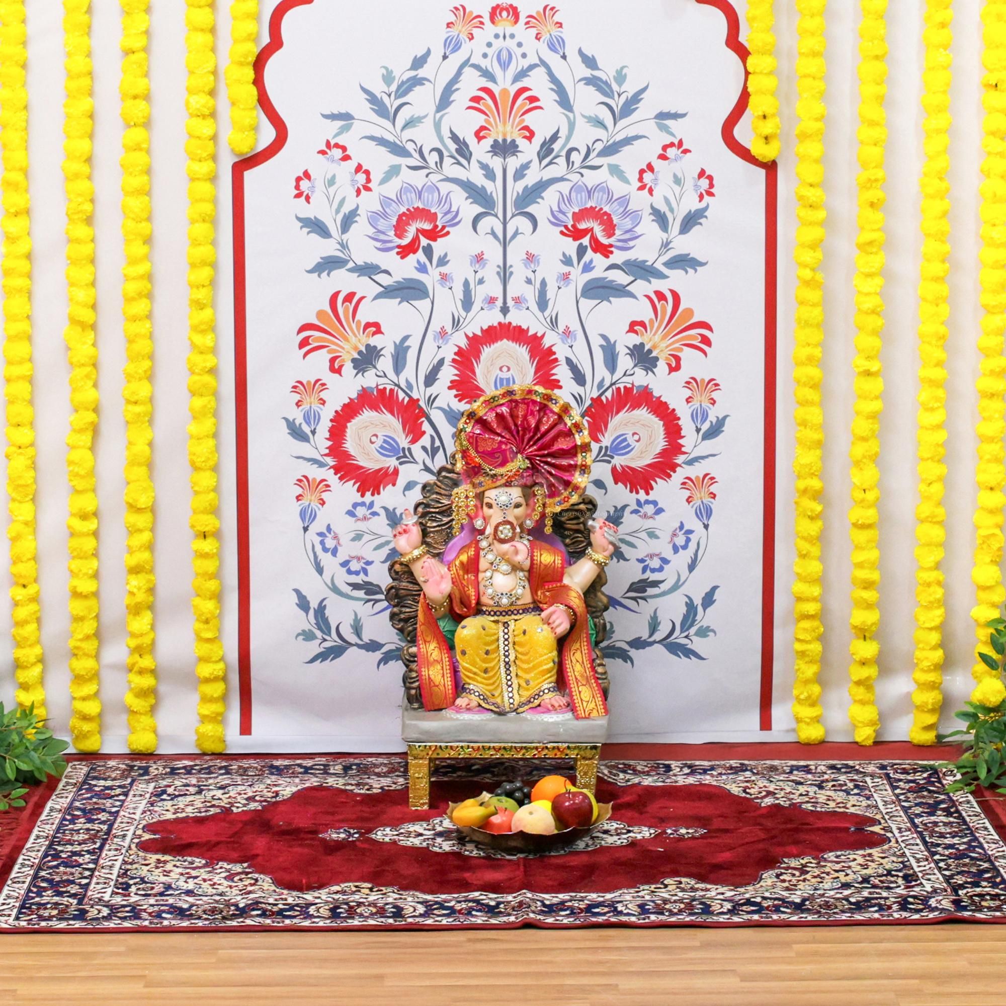 Two vibrant bouquets complete the ceremonial look and add colors