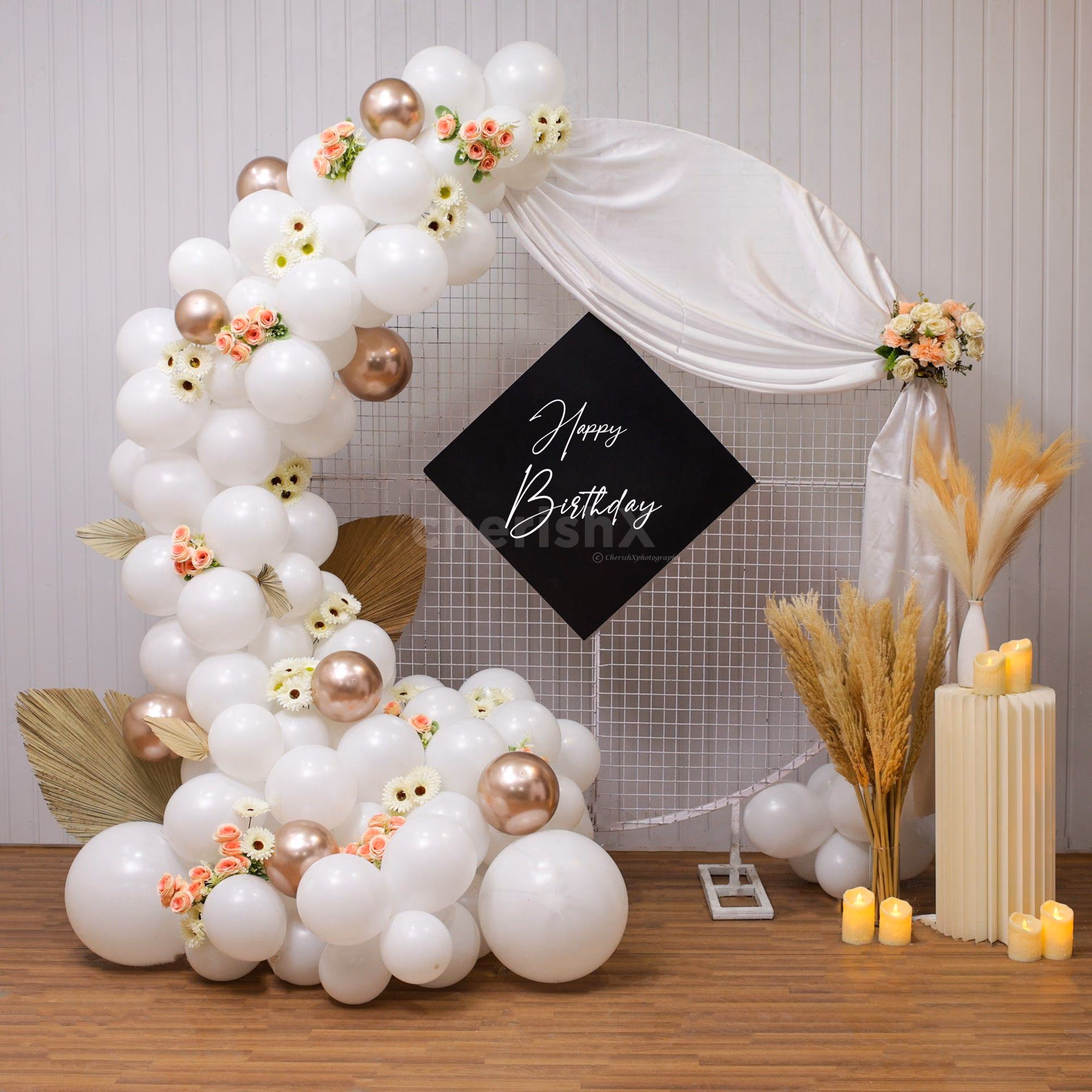 Perfect mix of balloons, flowers, leaves bunches, LED candle for Birthday decor