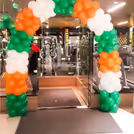 Sunboard cutout and ring of balloons create a visually pleasing celebration details