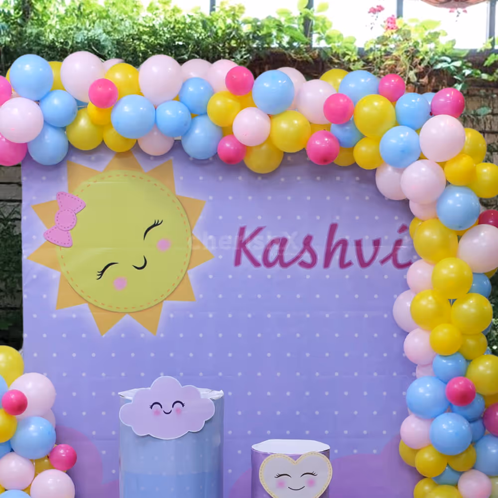 Customized flex backdrop with a smiling sun.