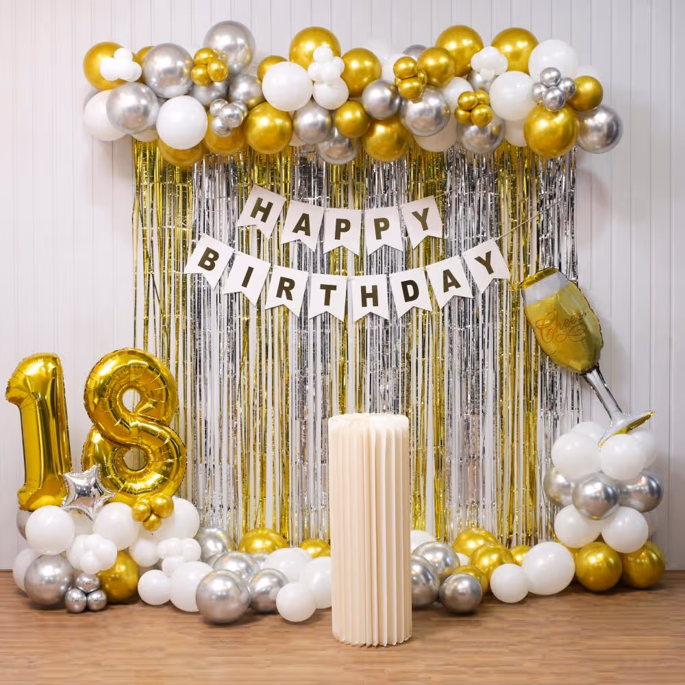 Add glamour to the birthday celebration with golden silver and white balloons