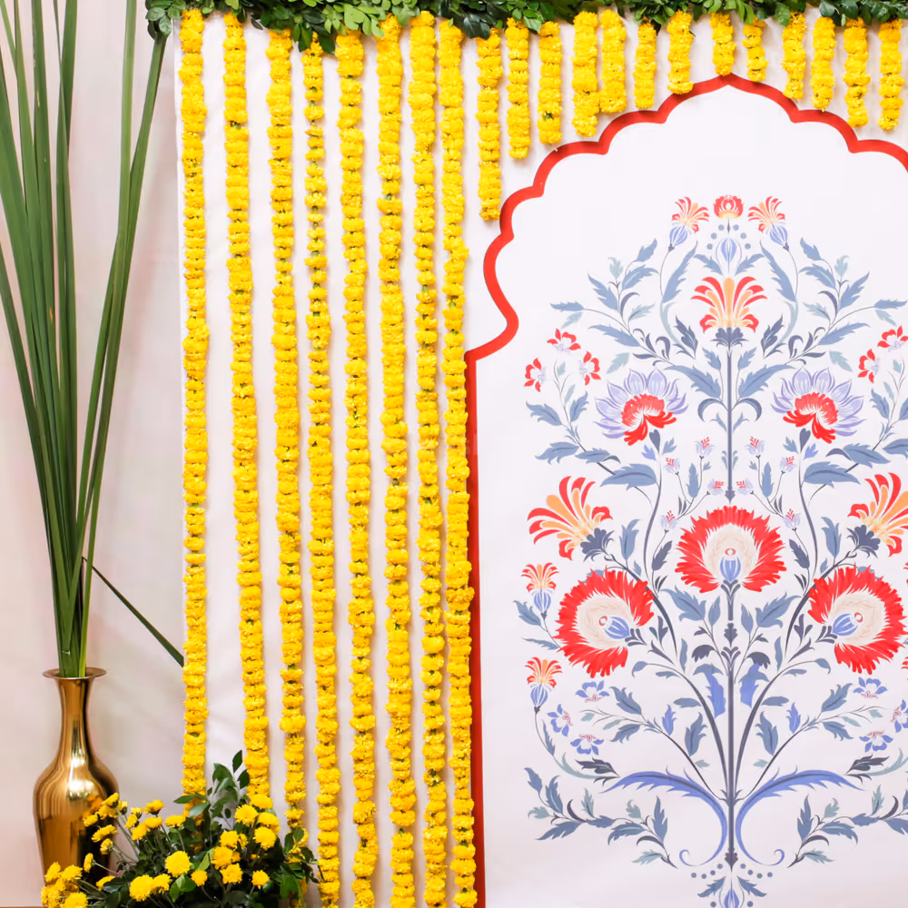 Green flower arrangements add a fresh natural aspect to the pooja decor