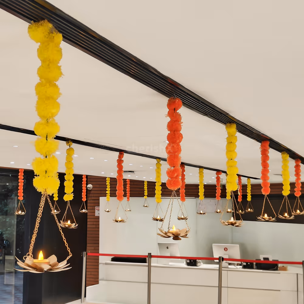 Brass lotus decor elements add glow with warm, festive lighting.