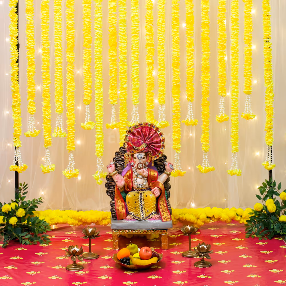 Fairy lights add sparkle for puja celebrations without overpowering venue lighting.
