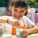 Stretchy, colourful slime made by excited little hands