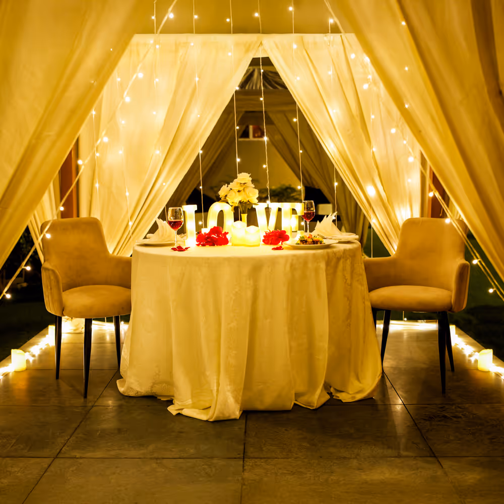 Romantic candlelight dining in gurugram, fairy lights setup dining