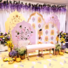 Royal pastel arch panels with floral paintings form a dreamy background.