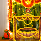 Diyas, coconut cutouts with mud pot highlights the occasions auspiciousness
