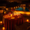Poolside candlelight dinner by hilton