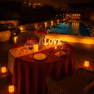 Poolside candlelight dinner by hilton