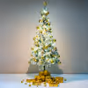 The golden star at the top of the tree highlights classic Christmas symbols.