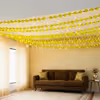 The ceiling shines bright with garlands and twinkling pixel lights for events.