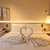 Towel art, bed decor, romantic stay for couples in gurugram