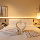 Towel art, bed decor, romantic stay for couples in gurugram