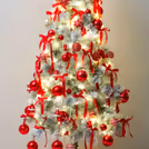 Handmade red bows emit the festival spirit hanging from the tree branches