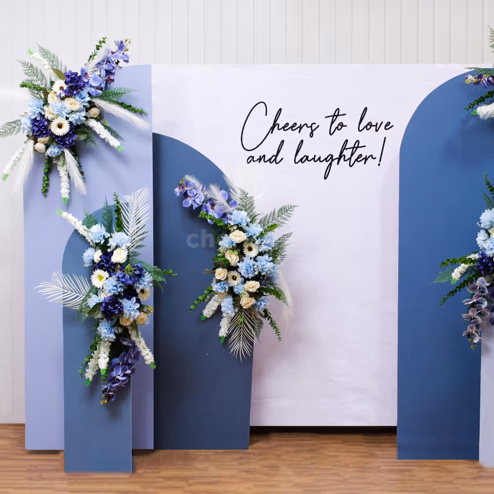 A backdrop of artificial flowers that radiate grandeur of engagement event