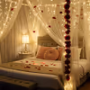 Romantic first night arrangement using artificial roses hanging and fresh rose petals