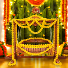 Golden and silver bells along with tassels add to the easy breezy feel of the setup