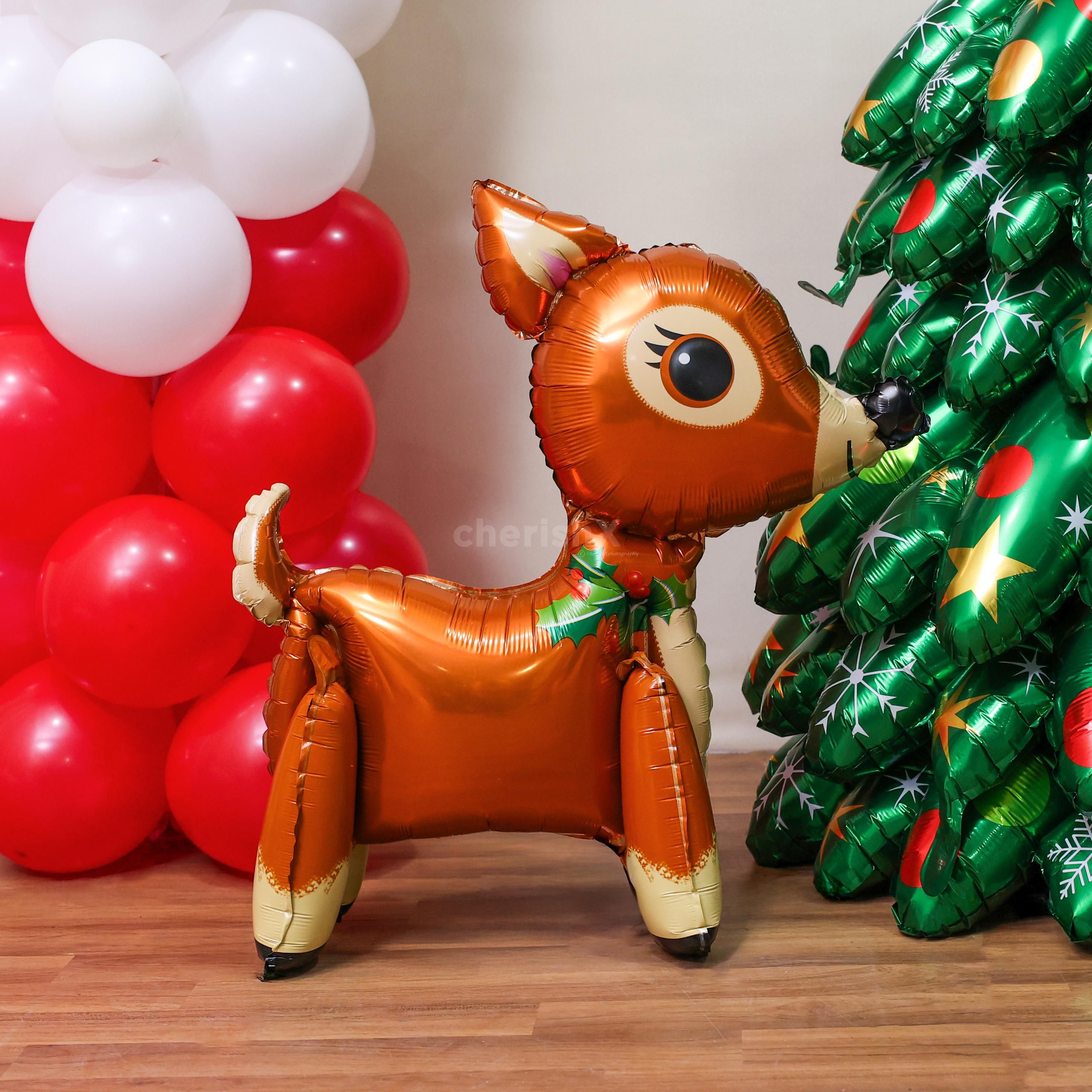 3D Christmas foil balloons tree makes a stunning photo backdrop at any venue
