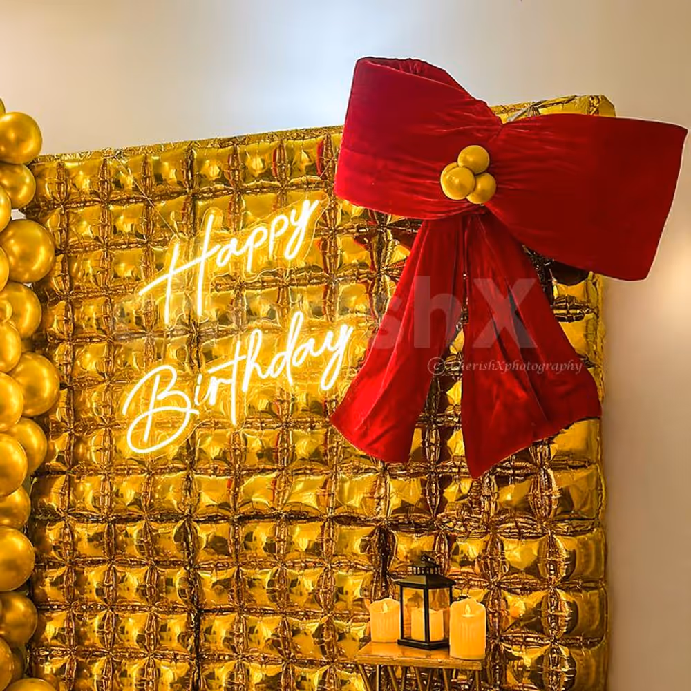 Multiple lighting, like neon B'day, floor lamps and LED candles, add to the warmth