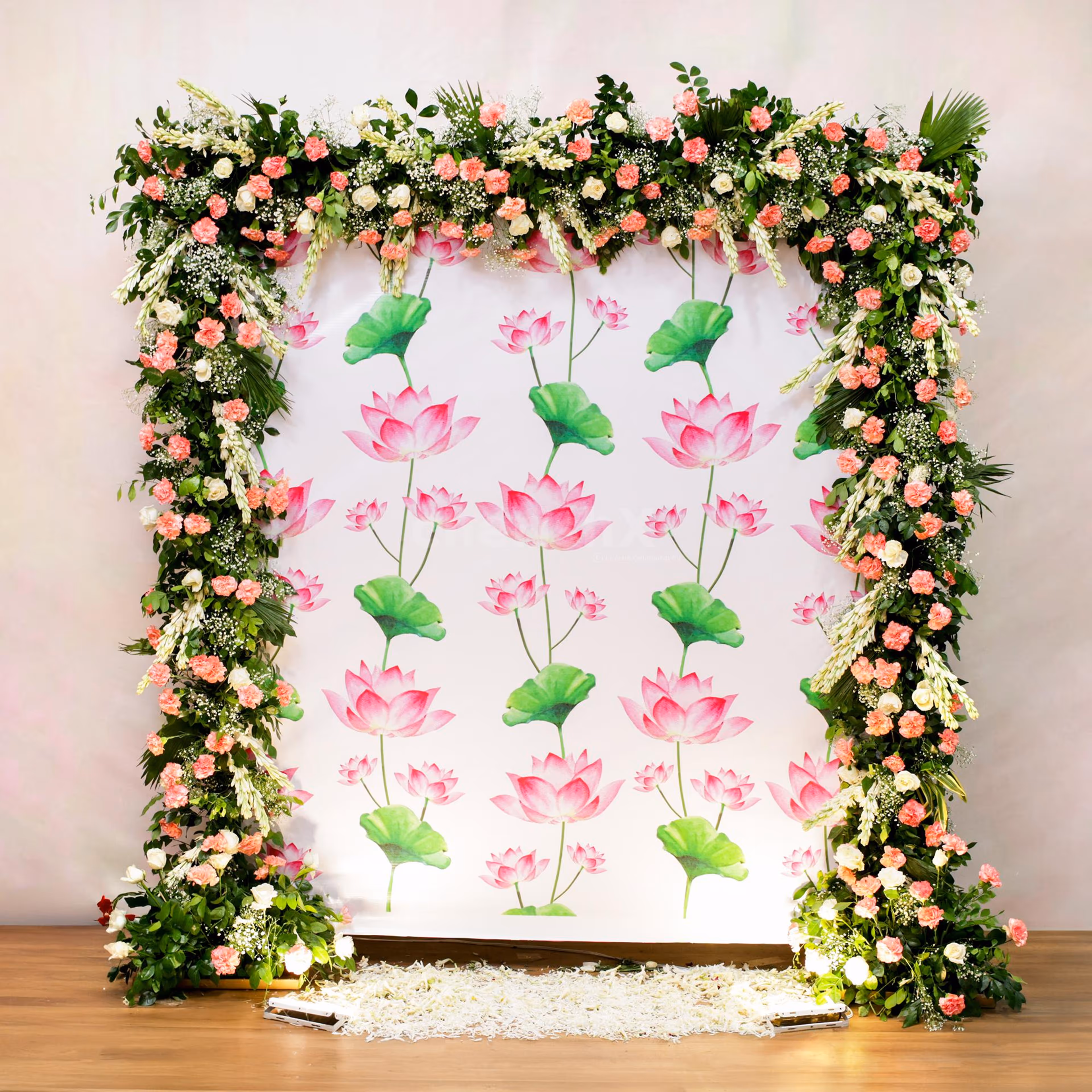 White roses and fresh pink carnations exude luxury and tranquility