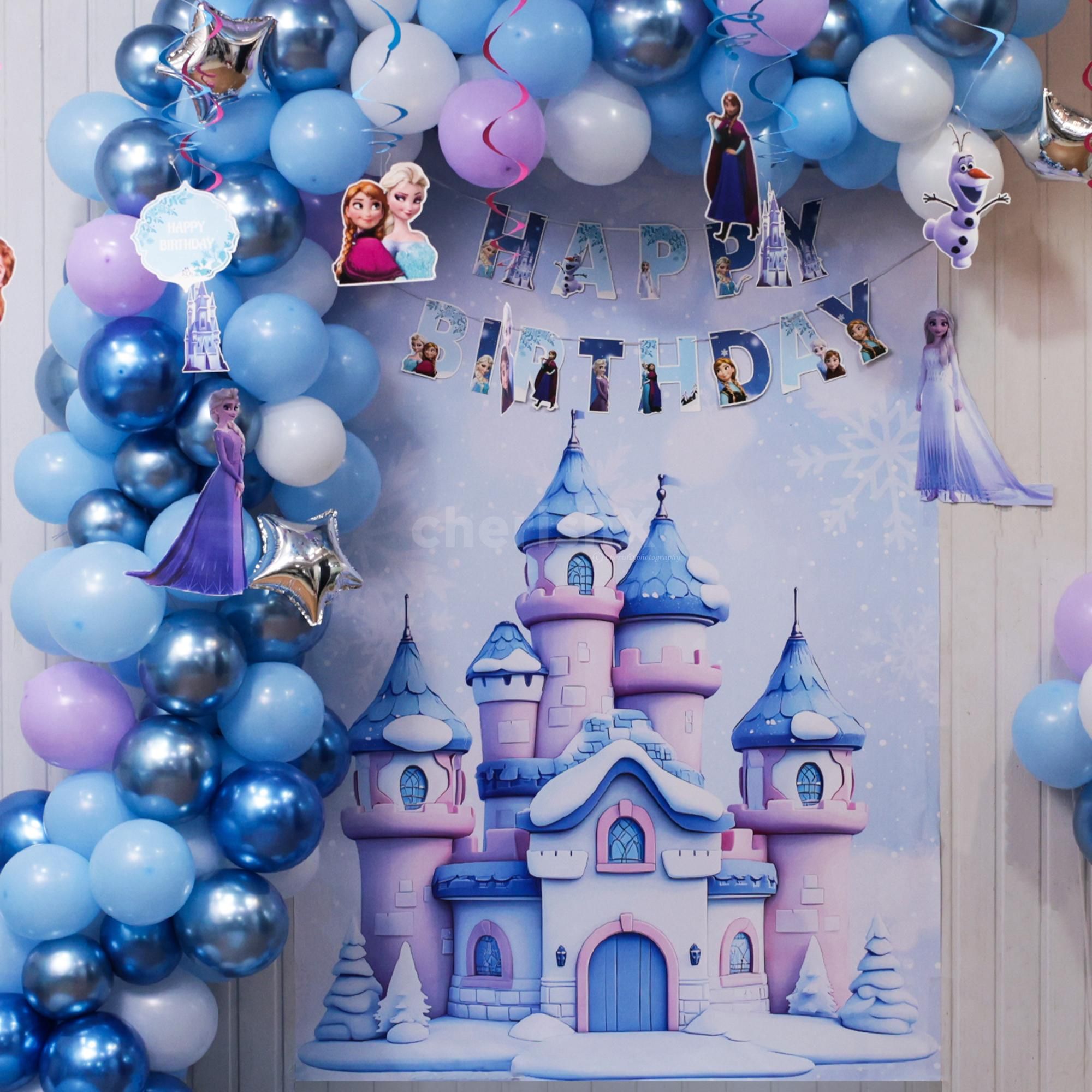 Chrome blue balloons swirl creating the perfect vibe for birthday pics